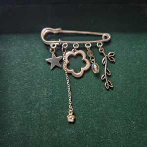 Silver Charm Brooch Pin with Star and Floral Accents